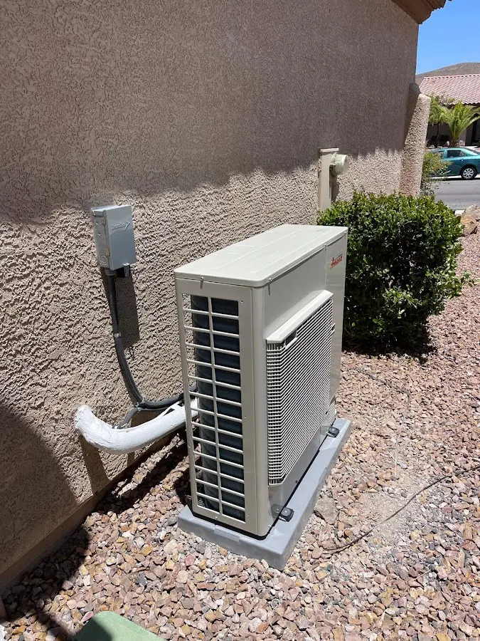 Residential air conditioning condenser unit in Aurora